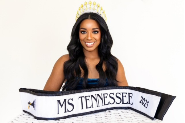 Asiana Swift Miller holding Ms Tennessee Banner