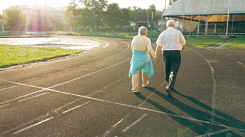 Two seniors taking a walk together