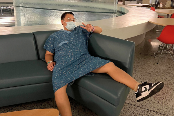 Randy Yim in hospital showing off his shoes