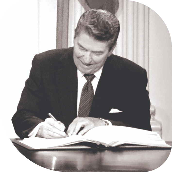 President Ronald Reagan signing a bill