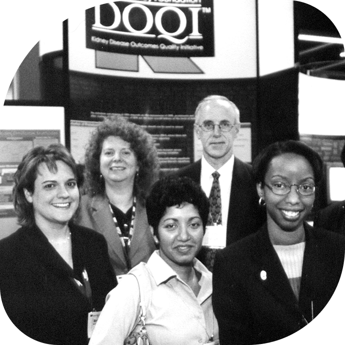 A group from NKF standing in front of a KDOQI sign