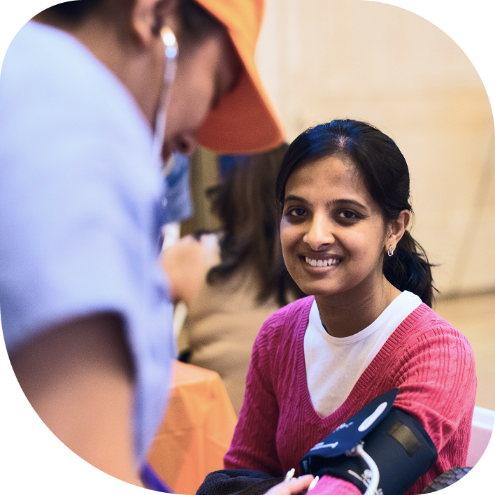 woman getting her blood pressure checked at an NKF KEEP event