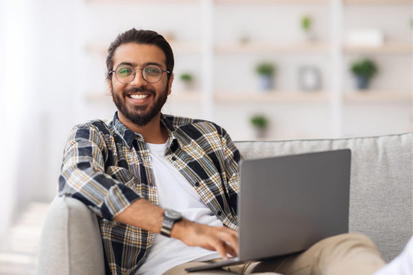 Person smiling while typing