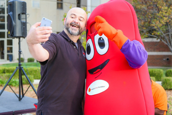 JJ Hayes and NKF kidney mascot