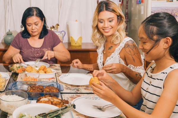 Multigenerational family enjoying dinner together
