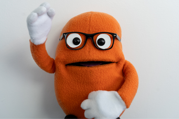 Kenny the Kidney puppet waving