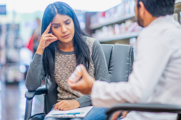concerned patient speaking to pharmacist