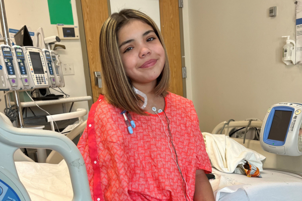 Reggie smiling in hospital gown