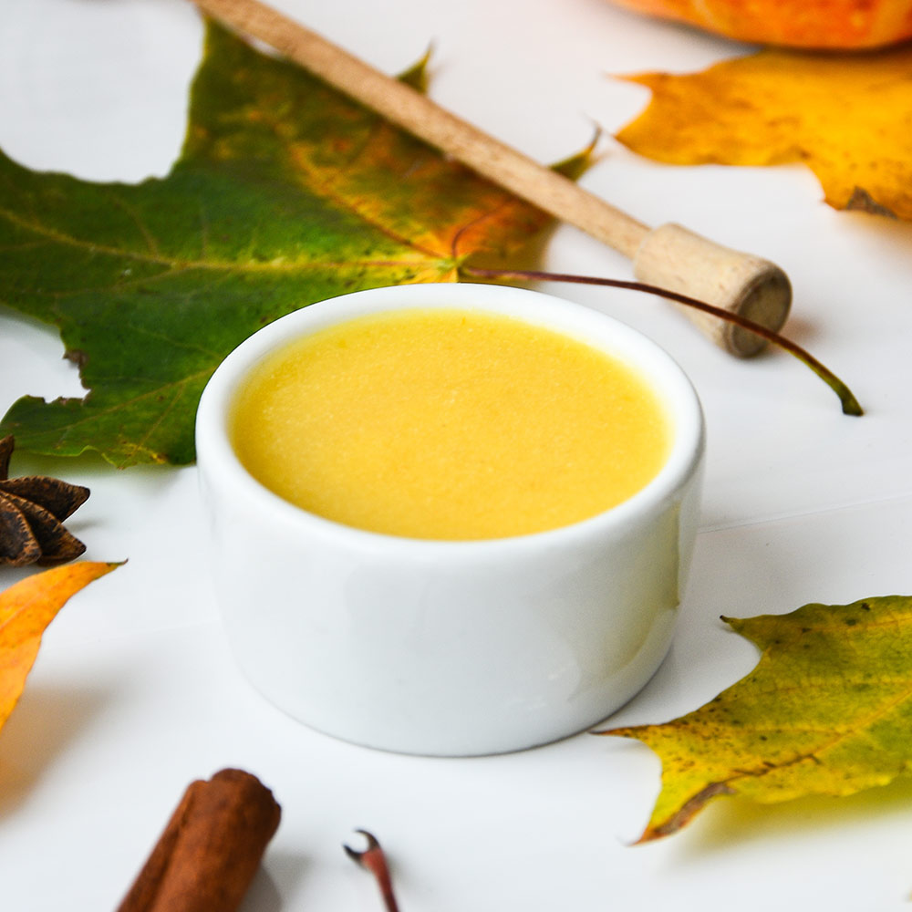 pumpkin maple custard surrounded by fall leaves