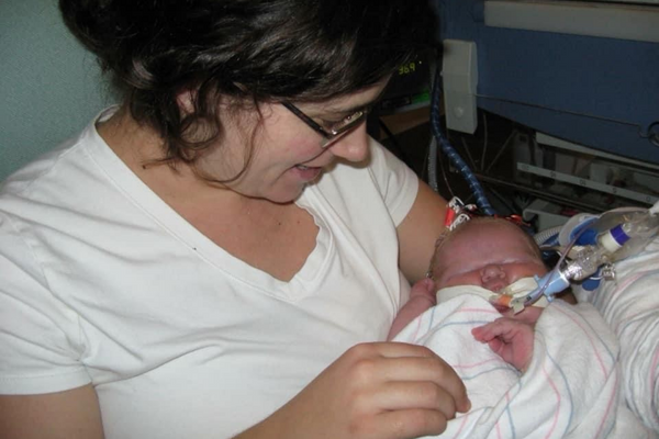 Jeni Slater holding baby Ellie