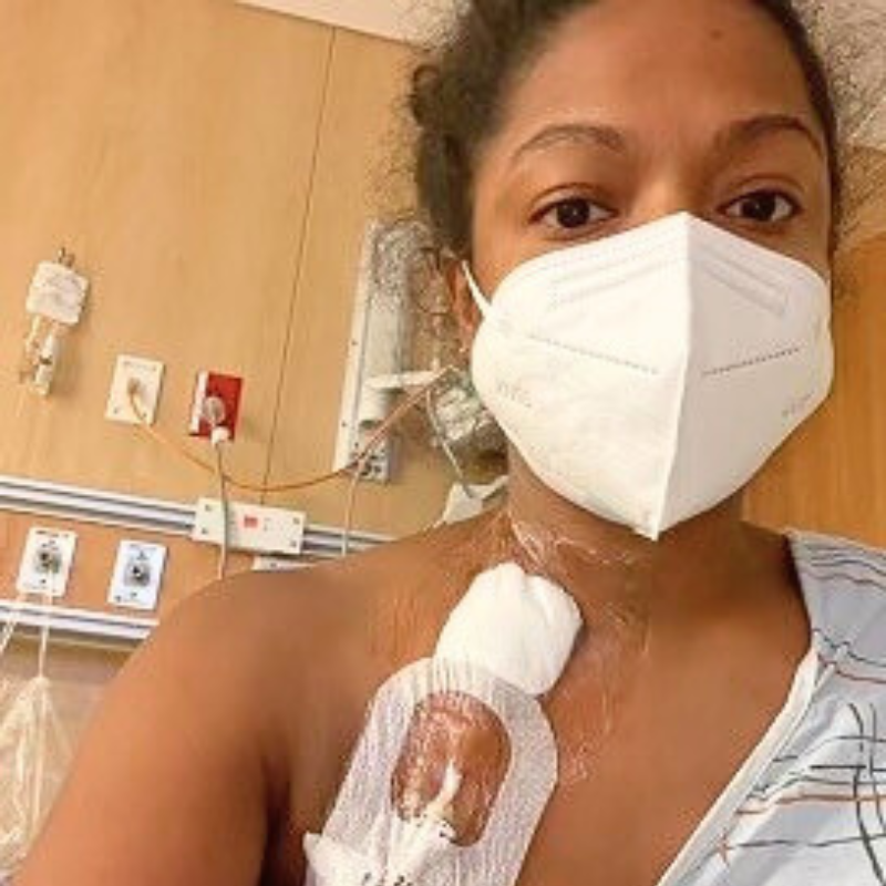 Nichole Baker masked in hospital with dialysis port