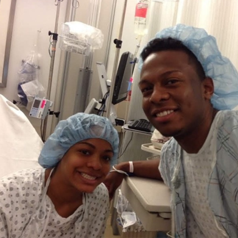 Nichole (L) and Brandon (R) smiling in the hospital together