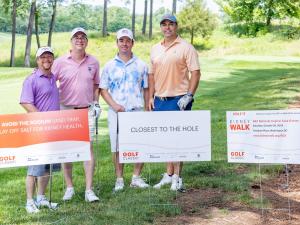 golfers at nkf golf event