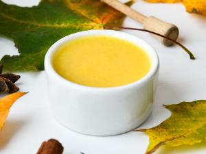 pumpkin maple custard surrounded by fall leaves