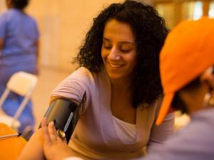 Woman getting her blood pressure taken at a KEEP Healthy Event