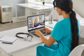 Doctor on a telehealth video call with patient