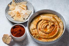 Eggplant dip with pita chips, paprika and garlic