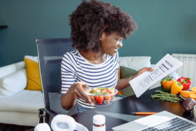 Happy person reviewing nutrition guidance
