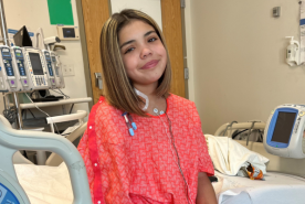 Reggie smiling in hospital gown