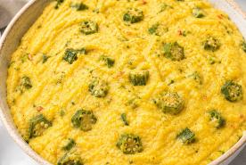 Bowl of cornmeal and okra coo-coo