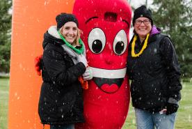 Laurie with Sidney the Kidney in the snow at Kidney Walk