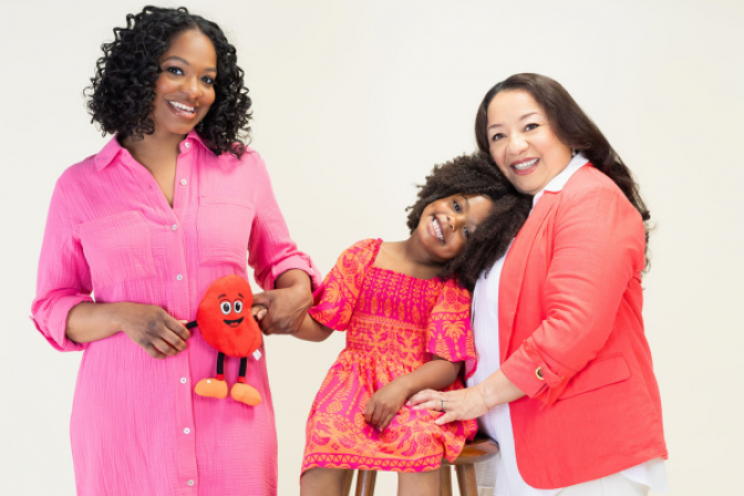 Nichole, her daughter, and mother in an NKF photo shoot