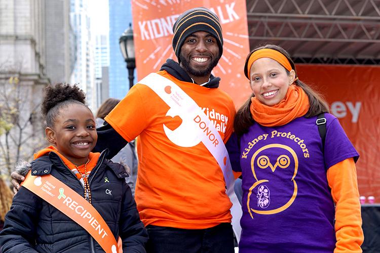 Kidney recipient and kidney donor posing together at a Kidney Walk