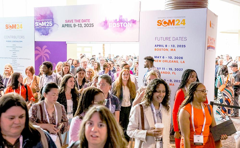 People entering the welcome hall at SCM24