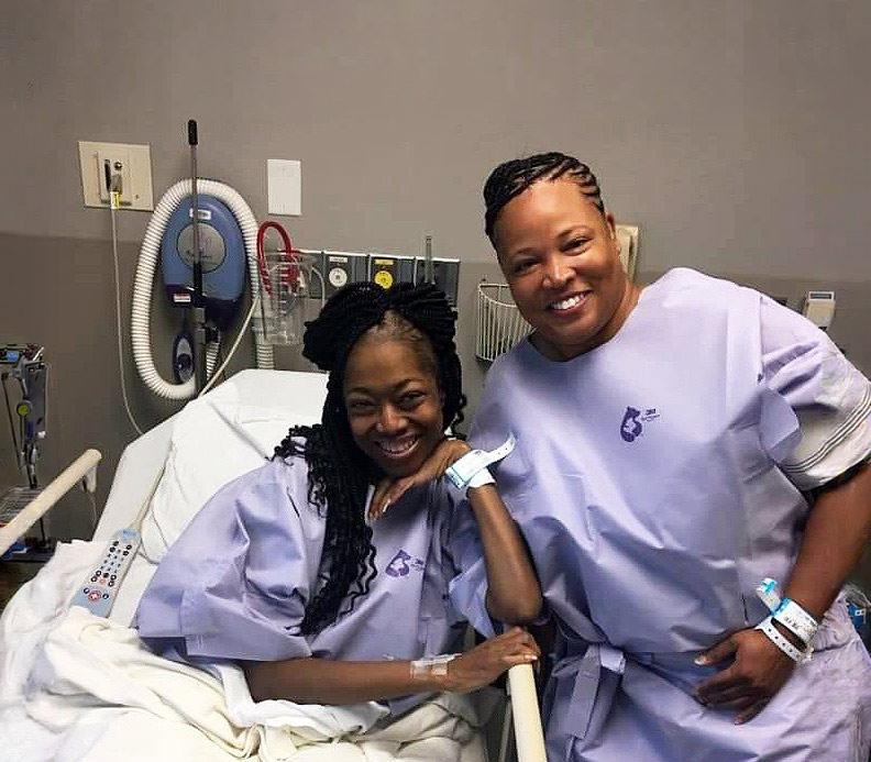 Living kidney organ donor and recipient posing together