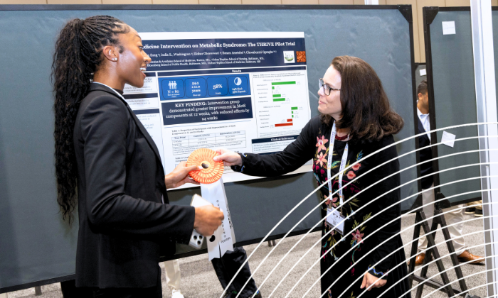 SCM abstract poster getting awarded a prize