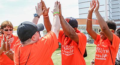 Volunteers cheering each other on