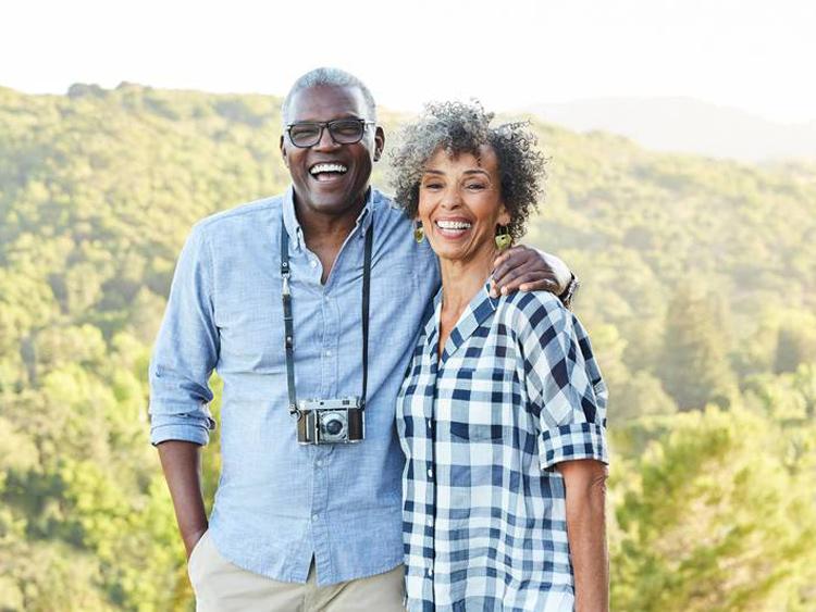 Senior couple posing and smiling